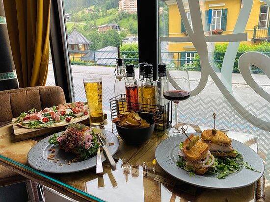 Lunch in Bad Gastein — food with Belle Époque facade and valley visible through large windows